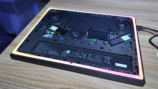 Asus ROG Strix Scar 18 2025 with the underside panel removed.