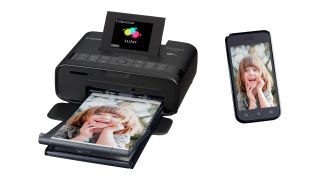 Canon SELPHY CP100 Photo Printer.