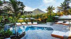 A view of Arenal Volcano National Park in Costa Rica from the pool area of Nayara Gardens in Costa Rica