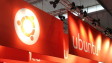 Orange Ubuntu banners hanging from the ceiling