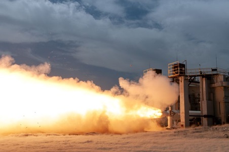 solid rocket motor test on cloudy day