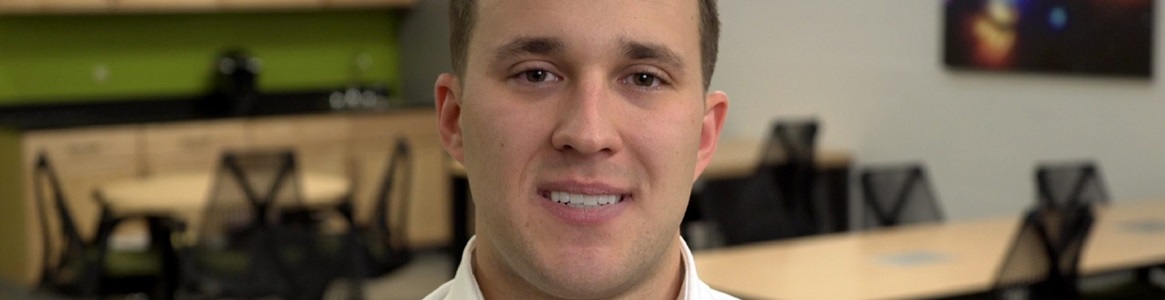 Headshot of caucasian male in classroom setting