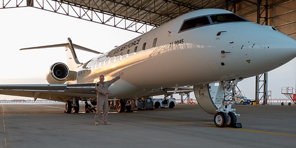 military jet parked in hangar