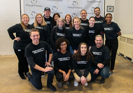 employees volunteering at a food bank