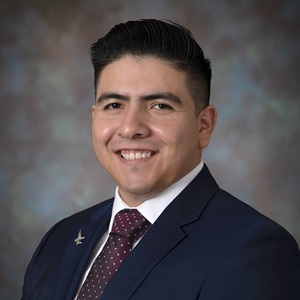 headshot of hispanic male