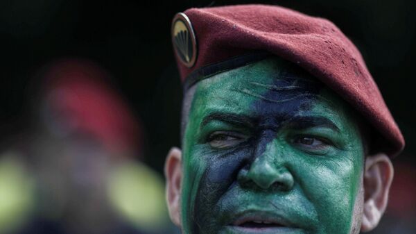 Homem com rosto pintado durante manifestação em apoio ao presidente Jair Bolsonaro durante o 57º aniversário do golpe militar no Brasil, Rio de Janeiro, 31 de março de 2021 - Sputnik Brasil