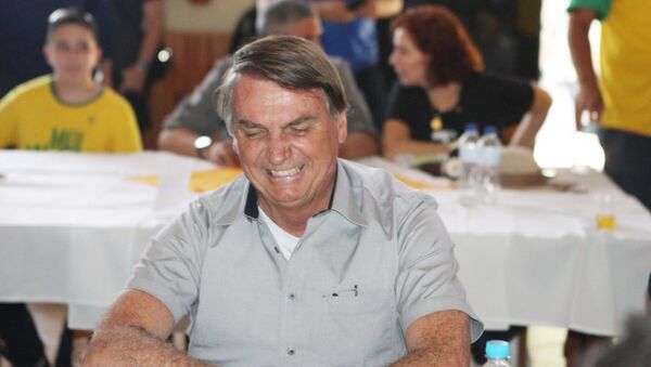 O presidente Jair Bolsonaro almoça no Centro de Tradições Gaúchas em Brasília (DF), com produtores e empresários do agronegócio. Foto de arquivo - Sputnik Brasil