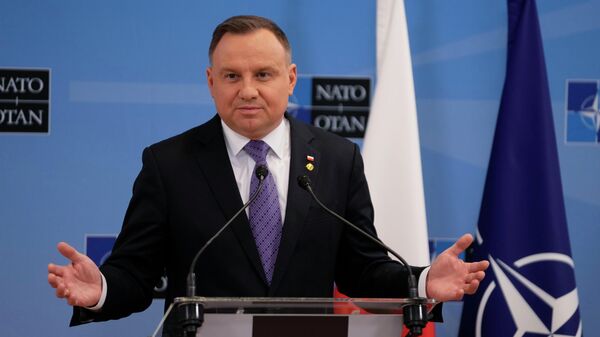 O presidente polonês, Andrzej Duda, fala durante coletiva de imprensa após uma reunião extraordinária da Organização do Tratado do Atlântico Norte (OTAN), em Bruxelas, Bélgica, 24 de março de 2022 - Sputnik Brasil