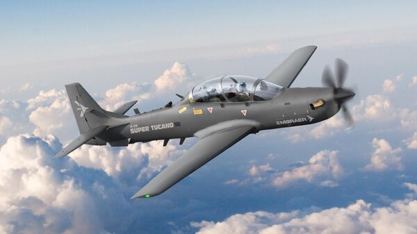 Ilustração digital do avião Super Tucano A-29 da Embraer em voo - Sputnik Brasil