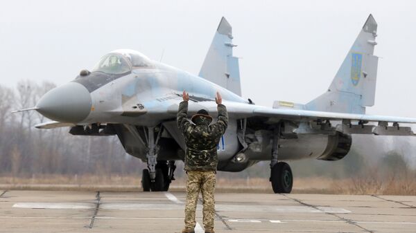 Caça ucraniano MiG-29 estaciona na base aérea de Vasilkov perto de Kiev, Ucrânia, 23 de novembro de 2016 - Sputnik Brasil