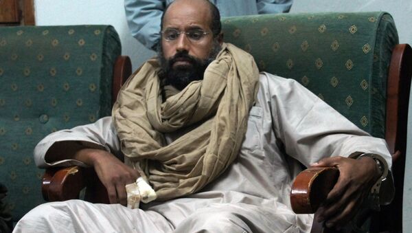 In this Saturday, Nov. 19, 2011 file photo, Seif al-Islam is seen after his capture in the custody of revolutionary fighters in Zintan. - Sputnik Brasil