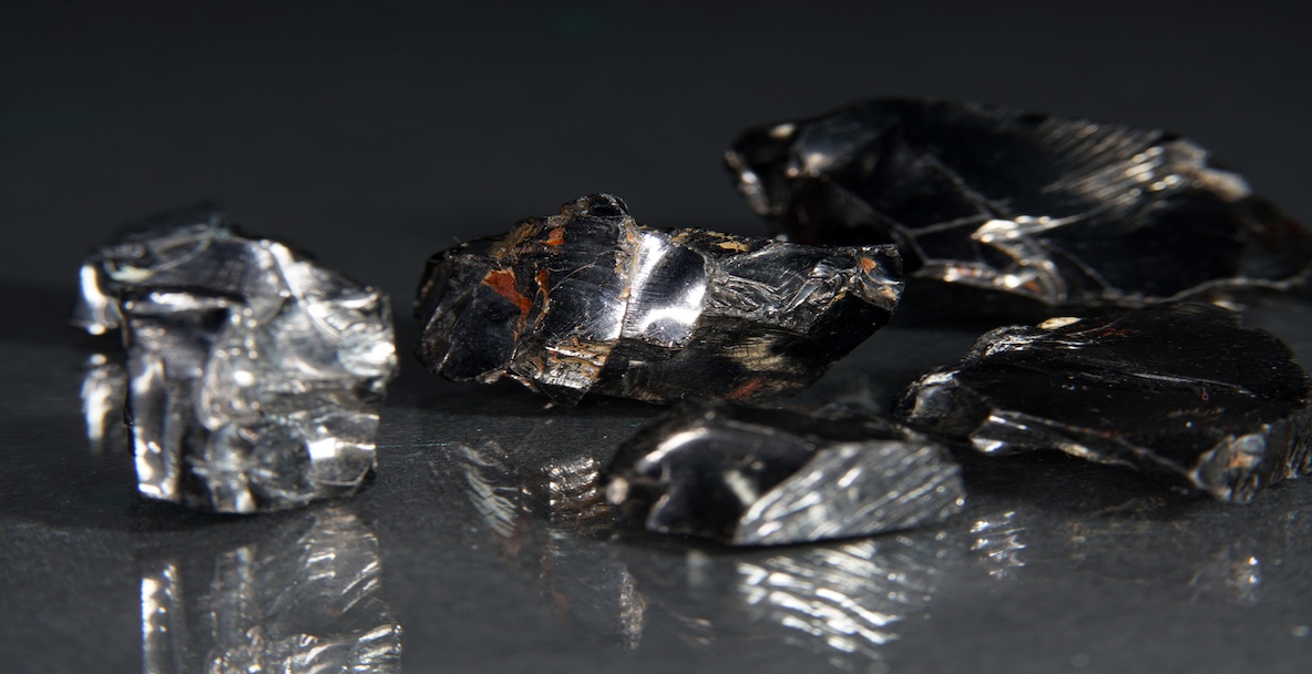 An image of gallium stones against a black background