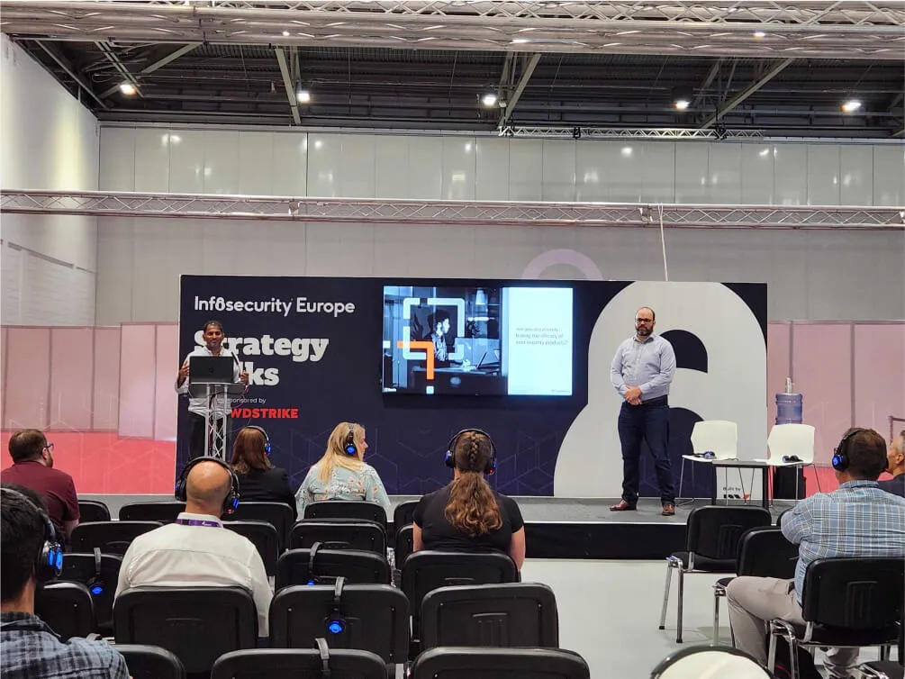 Raghu leading a presentation at Infosecurity Europe.