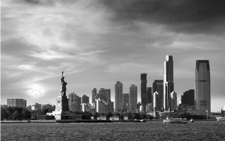 Photograph of Berkeley Heights skyline with Ellis Island and the Statue of Liberty in the foreground