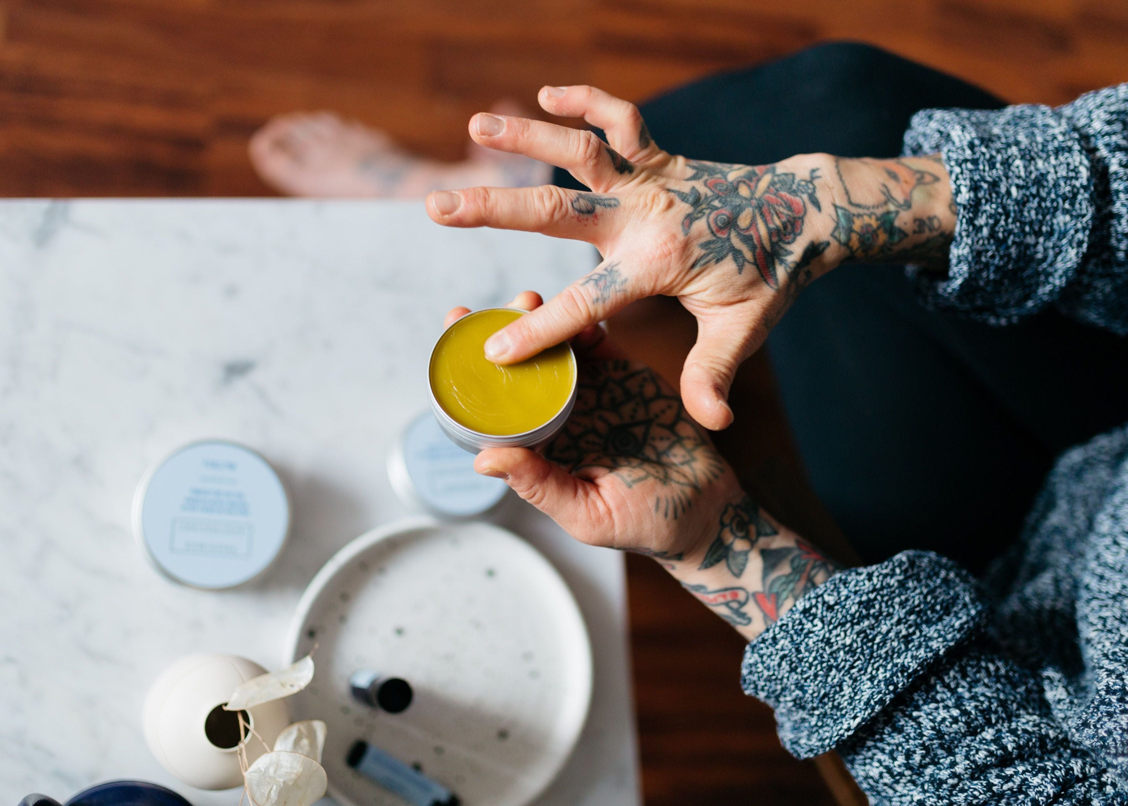 A model using a balm from Province Apothecary.