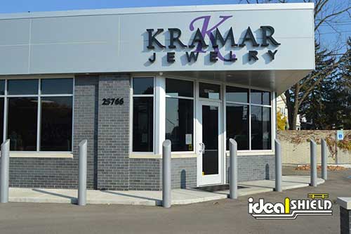 Pipe parking bollards protecting a jewlery store