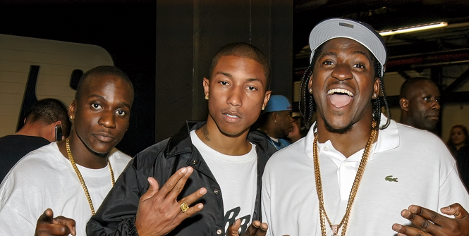 photo of 3 men posing for candid snapshot