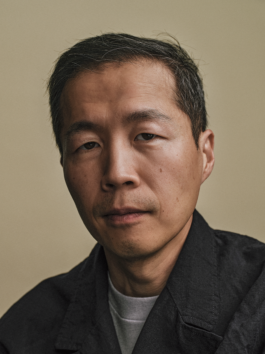 A portrait photograph of director Lee Isaac Chung.