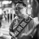 Pro-democracy district-council candidate Andrew Chiu, who was attacked by a man who bit off part of his ear in early November, canvasses on the street during the district council elections in Tai Koo Shing District Council in Hong Kong on November 24, 2019.