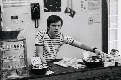 Craig Rodwell behind the counter at the Oscar Wilde Memorial Bookshop