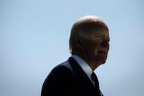 Photo of Joe Biden against a blue sky