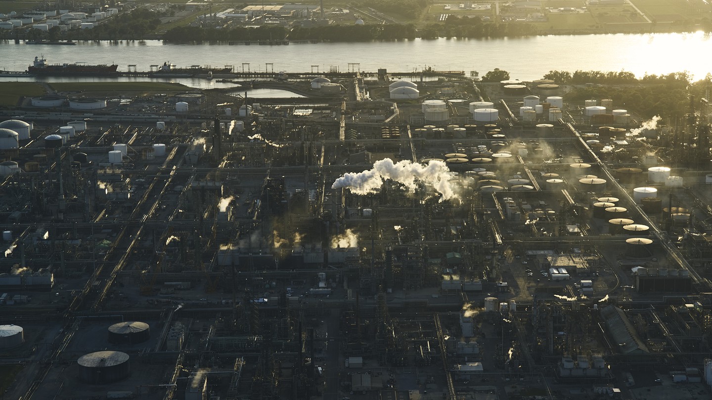 An overhead shot of chemical plants along a river