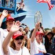 A photo of enthusiastic Trump supporters at the Iowa State Fair.