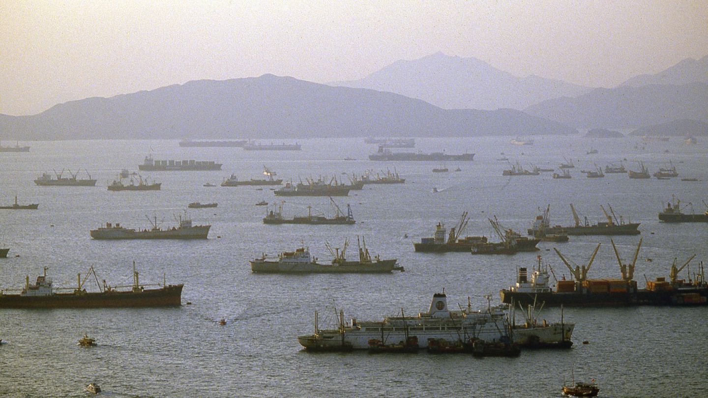 An aerial view of cargo ships in Hong Kong harbor.
