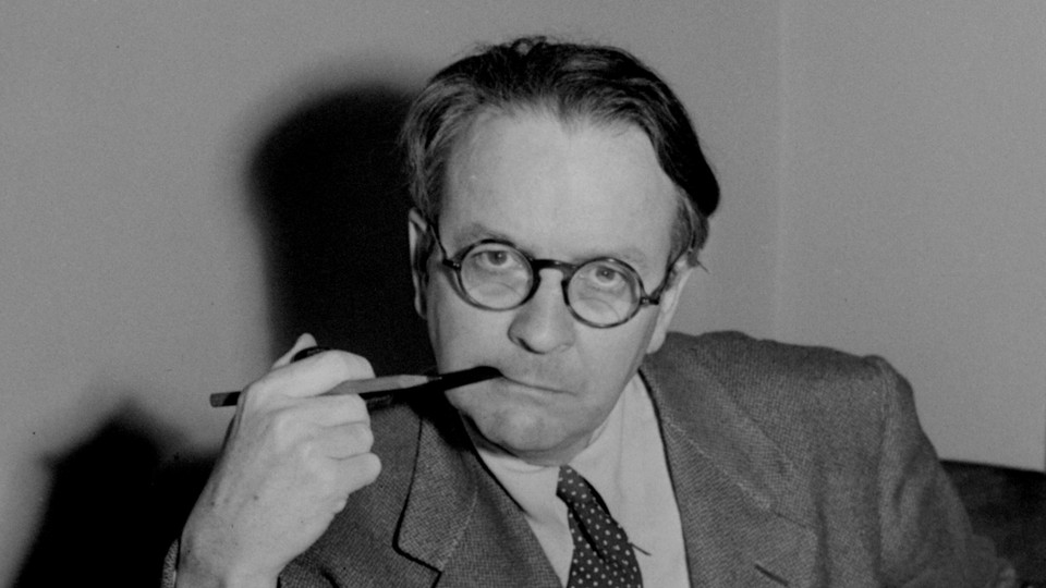 A black and white portrait of Raymond Chandler