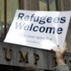 Protesters gather outside the Trump Building to take action against America’s refugee ban.