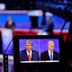 A monitor shows Trump and Biden during the first 2024 presidential debate