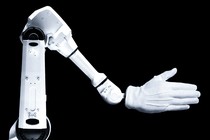 Illustration of a white robotic arm wearing a white glove against a black backdrop