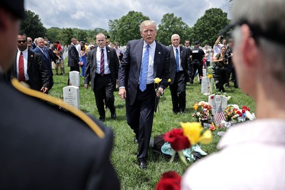 Donald Trump greets families of the fallen at Arlington National Cemetery on Memorial Day 2017.