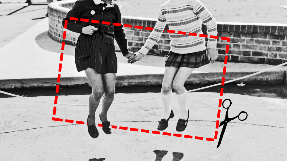 A dotted-line rectangle representing a label, with an image of scissors snipping it, overlays a black and white image of two young girls holding hands and jumping in the air