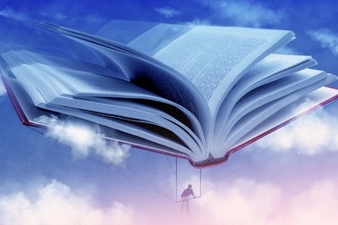A person using a book as a hang glider