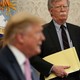 John Bolton looks at Donald Trump