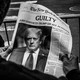 A photo of someone holding a copy of The New York Times. The front page features a story about Trump's conviction