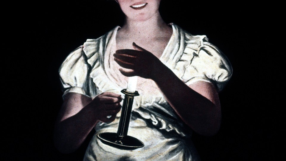 An illustration of a woman holding a candle and smiling, backlit