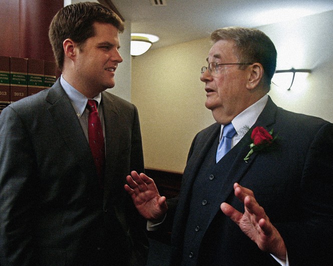 Picture of Matt Gaetz listening to his dad, Don Gaetz, in the House of Representatives at the Capitol in Tallahassee, Florida.