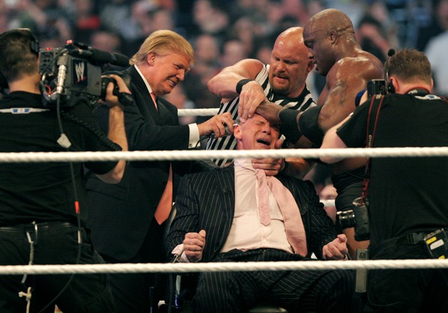 Trump’s constant debat­ing goal is to humiliate a foe. Here, he shaves the head of rival promoter Vince McMahon after Trump’s wrestler defeated McMahon’s in a 2007 WWE bout.