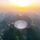 China's FAST telescope sits nestled in a mountainside.