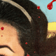 Blood spatters across a print of a woman's face and a laundry line