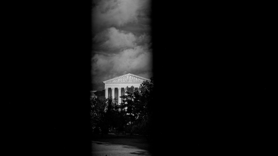 Black and white photo of the Supreme Court building