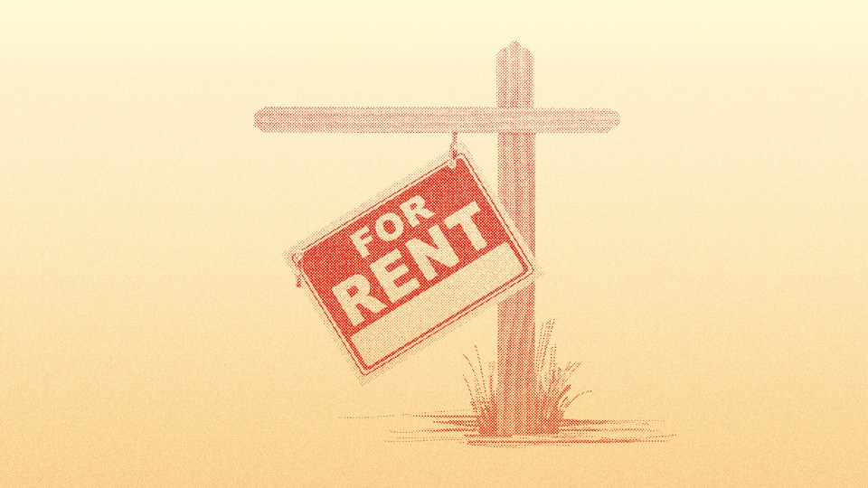 A "For Rent" sign hanging crookedly off a post