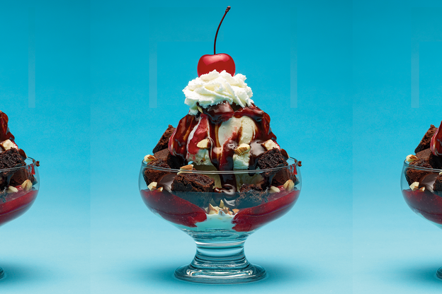 A photograph of a hot-fudge brownie sundae