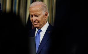 Picture of Joe Biden over a blurred background.
