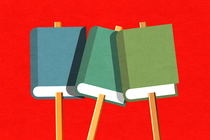 Books on sticks like picket signs against a red background