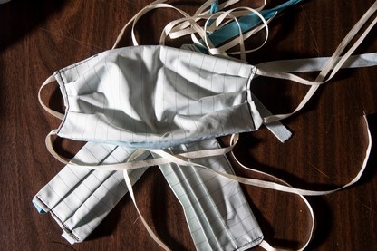 Several cloth masks lying on a table