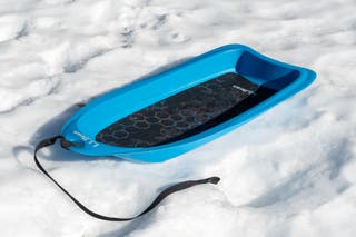 A L.L.Bean Polar Slider DLX Sled in the snow.