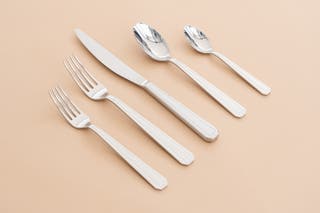 The Degrenne Normandy Miroir 5-Piece Flatware Set.